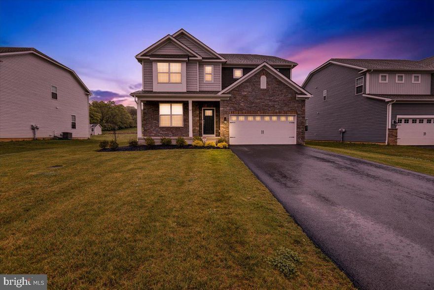 Welcome to the prestigious Glen Ridge built by D.R. Horton where upgrades are their standards. Located in the Wilson School District, this home was built in 2023 with an open floor plan and careful design in mind. Upon entering this five-bedroom home you are greeted with LVP floors and a formal living room. Walking down the foyer opens into a generously sized eat-in gourmet kitchen boasting large kitchen island, soft close doors and drawers, stainless steel appliances, side by side fridge and double wall oven. All counters are topped with Consentino Silestone quartz with upgraded full height backsplash. Complimentary Butler’s pantry for food prep and private preparations. From the view of the kitchen is the family room and corner gas fireplace. There is a first-floor bedroom, pantry area and full bathroom. Plenty of closet space and mud room including an additional SS fridge. The second floor has four bedrooms, ample closet space, laundry room, full bathroom, and master suite w/ private bath. For additional entertainment space this gem comes with a finished basement, utility room, storage room and rough-in for a fourth bathroom. Some special mentions include a two-zone upgraded HVAC with electronic damper, Rannai tankless water heater for endless hot water, underground front lawn sprinkler system, Alliance Water-Softener, SMART HOME TECHNOLOGY, Z-Wave programmable thermostat and Z-Wave door lock system. Make your appointment today for a tour. Ready for immediate possession.