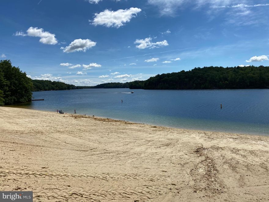 Enjoy the amenities of Lake Holiday with the ownership of this MEMBERSHIP lot. Lake Holiday is a 240 acre recreational lake in a private, gated community. The community has a clubhouse, three beaches, fishing pier, beach volleyball, playgrounds, disc golf course, basketball and tennis courts, dog park, campground, trails, and much more! Bring your boat and enjoy all the recreational amenities available. This lot is NOT a buildable lot. You will need to be accompanied by a realtor to tour the Lake Holiday community.