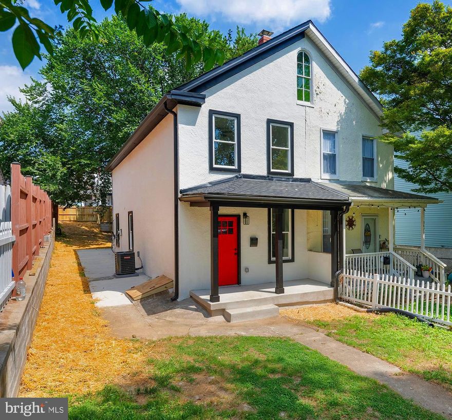 Nestled on sought-after Roland Avenue in the heart of Hampden, this fully renovated semi-detached home offers an exceptional blend of charm, luxury, and rare outdoor space. Set on an unusually deep 150-foot lot with THREE CAR PARKING pad—a true rarity in the area—this property provides ample room for outdoor entertaining, gardening, or expansion.

The open-concept main level is filled with natural light and features wide-plank solid white oak floors throughout, creating a warm and sophisticated backdrop. The inviting living room flows seamlessly into the dining area and thoughtfully designed kitchen, which features green slate cabinetry, crisp quartz countertops, a spacious eat-in island, and sleek stainless steel appliances. A convenient walk-out from the kitchen leads to the expansive backyard—perfect for enjoying outdoor living.

Upstairs, the second level offers a sunlit guest bedroom with generous closet space and a hallway bathroom finished with stunning green Spanish tile (imported from Spain) and natural Italian marble hexagon floors. The owner’s suite provides a peaceful retreat, complete with an en-suite bath featuring timeless white subway tile, a walk-in shower, and a striking mosaic tile floor crafted from exotic Calacatta and black marble.

The third-floor loft is a charming bonus space, ideal for a home office, cozy reading nook, or creative studio.

Located in the heart of Hampden, you’re just steps away from The Avenue on 36th Street—home to an eclectic mix of locally loved restaurants, shops, cafes, and art galleries. Explore neighborhood favorites like The Food Market, Golden West Cafe, and Dylan’s Oyster Cellar, or enjoy nearby green spaces including Wyman Park and the Jones Falls Trail. The Rotunda, the Baltimore Museum of Art, and Johns Hopkins University are just minutes away, with easy access to I-83 for a quick commute.

Recent updates include all-new energy-efficient windows, a new HVAC system, and a new roof—offering modern comfort and long-term peace of mind.