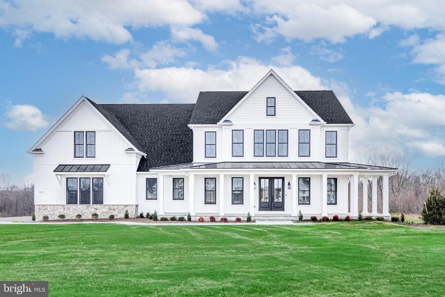 JANUARY 2026 MOVE-IN!!! ... Seize the final opportunity for your new dream home in the coveted Ridge at Falling Green community in Mt. Airy. Catonsville Homes proudly presents the custom Chapel Hill II floorplan, perfectly positioned on an expansive 19+ acre cul-de-sac homesite. As you approach, the full porch captivates with its elegant metal seam roof, complemented by a sophisticated stone-to-grade front and premium vinyl siding. The property offers a practical 3-car side load garage for your convenience. Step inside to discover an inviting open layout featuring impressive 10-foot ceilings on the first floor. The gourmet kitchen, a culinary haven, boasts a large island, upgraded countertops, and a walk-in pantry complete with a separate sink and dishwasher. Enjoy your mornings in the bright morning room or unwind in the spacious family room, which includes a gas fireplace adorned with a shiplap surround. The mudroom, featuring built-in cubbies and a convenient drop zone, is accompanied by a first-level powder room for added ease. On the second level, four bedrooms and four baths await, highlighted by a luxurious primary suite with a spa-inspired bath. The walk-in laundry room adds everyday practicality. The finished walkout lower level with a full bath further enhances the living space. This home beautifully blends modern comfort with timeless elegance, offering an exceptional living experience in a serene and scenic setting. Don’t miss the chance to make this exquisite property your own!