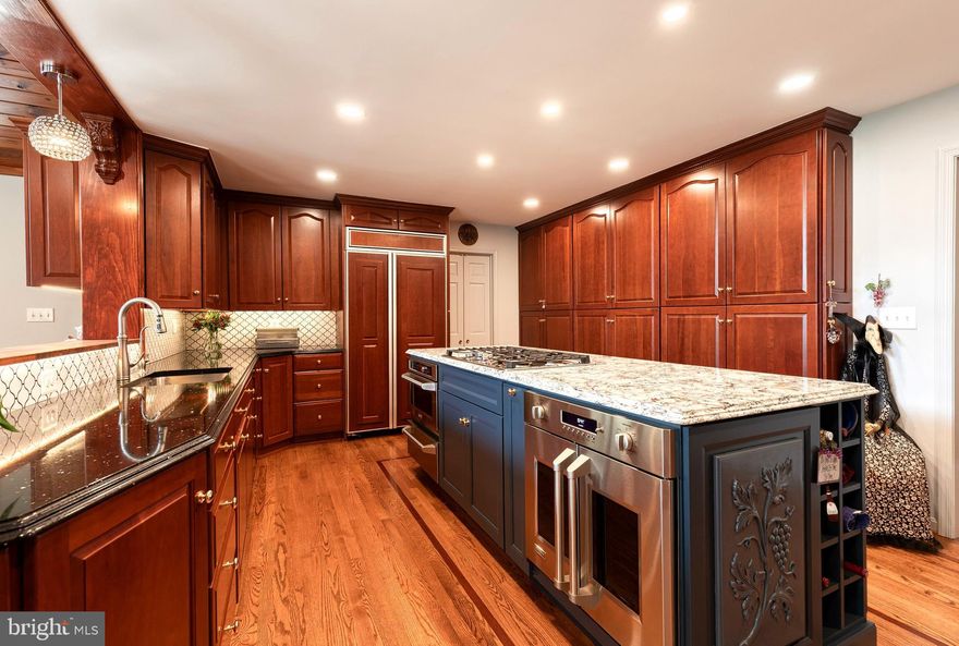 Welcome to 9 Tree Farm Court – A Hidden Sanctuary in Glen Arm
Tucked away in one of Glen Arm’s most desirable private enclaves, this exquisite home is nestled on a picturesque 1.01-acre lot that feels like your own private botanical garden. From the moment you enter, you’ll be captivated by the craftsmanship, warmth, and serenity this home offers.
The heart of the home is a beautifully renovated chef’s kitchen with beautiful cherry cabinetry, an oversized island with gas cooktop, double ovens, and high-end appliances – all overlooking the spectacular great room addition with vaulted wood ceilings, fireplace, and floor-to-ceiling windows bringing the outside in. Four spacious bedrooms and two and a half baths, including a renovated spa-like primary suite, with radiant heated floors, brand new whole house generator, and exquisite tilework.
Step outside and discover a landscaped paradise: walking paths, mature trees, vibrant perennials, and tranquil garden seating areas – it’s a setting rarely found and impossible to duplicate.
Every inch of this home reflects pride of ownership, thoughtful updates, and a connection to nature that is both calming and inspiring.