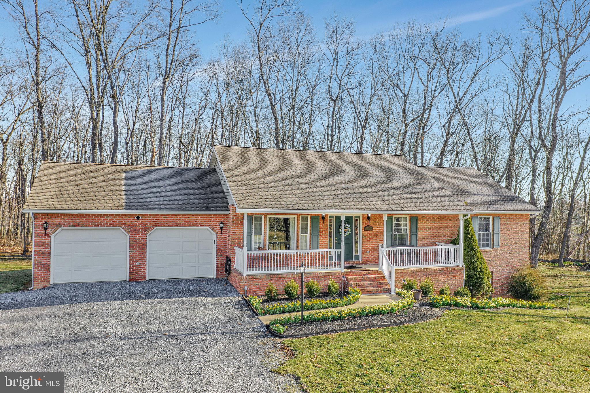 A MUST SEE!!!!!!!!!! Immaculate Rancher 3 Bed 2 Bath Master Bedroom on the first floor on a picturesque lot!!! This setting is very unique!! Won't be on market long!!!!! 2.5 Wooded Acres minutes from exit 20, and shopping, off route 81. Minutes from MD line. All Brick!!!! New Deck, new heat pump! Downstairs with a Walkout Basement, Man Cave, gas fireplace, full bath, 4th bedroom with 750 square feet finished as well, and another 750 square feet storage that can be finished. Unrestricted lot, but will have relaxed restrictions attached. There is a 2.5 Wooded acre lot adjoining that may possibly be available at a later date with same restrictions. Spring Mills High School district! Settlement can't occur before July 15th 2021. All offers must be sent by 5pm Tuesday 3-30-2021