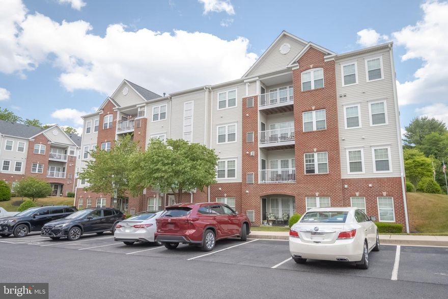 Meticulous condo with all the bell and whistles.  This beauty has only had one owner.  Carefully selected features make this home move in ready.  New carpeting throughout, custom shades and window treatments, recess lighting, crown molding and chair rail throughout,  fireplace in the family room with custom mantel and so much more.  The chefs kitchen has maple cabinets, under cabinet lighting, backsplash, stainless steel appliance and hardwood flooring.  Neutral paint colors throughout this home and tons of natural light flood every room.  Relax in the cozy sunroom or spend your evenings on  the quite porch with a glass of wine overlooking the beauty of the trees.  This one is ready to go.