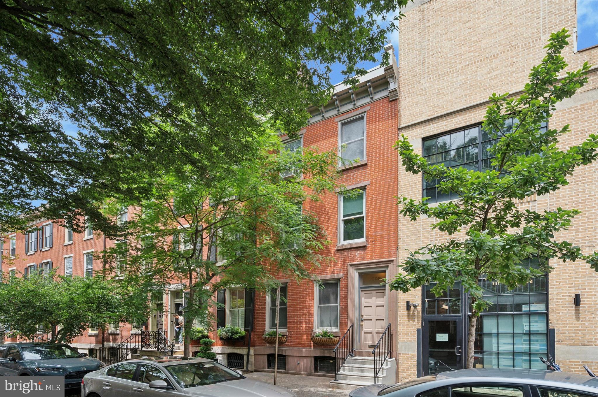 SHOWINGS START SATURDAY 6/21/25, AT OPEN HOUSE 12-2pm.
Welcome to 2205 Pine Street located in the heart of Fitler Square and the Albert M Greenfield School Catchment. This fabulous find is a wonderful opportunity to own a historically registered home with unlimited potential to make it your own or a profitable investment for resale. Values of renovated homes in the area exceed $1.2 million+. The 16x50 lot boasts original details throughout including oak hardwood floors, decorative statuary marble fireplace, high ceilings, garden & terrace, solid straight staircase and more. Enter through the enclosed vestibule entrance with French glass door leading to a spacious open concept living, dining and kitchen with beautiful inlaid oak flooring. The neutral kitchen is equipped with Bosch dishwasher and Kitchen Aid microwave overlooking the lovely open brick garden accented with perennial foliage, concord grape vines, herb garden and annual plantings. Take the handsome wood staircase to the second floor where you're introduced to a large full bathroom with washer/dryer included. Continue down the hallway, first to the middle bedroom and then to then front primary bedroom open to converting your desired space. Up to the third level landing you're greeted by the door to an unfinished terrace to create a private oasis for outdoor living space. And use your imagination transforming 2 more bedrooms with solid salmon brick walls. Moving down the hallway is unfinished space for a walk-in closet/future bathroom that can nicely accommodate both bedrooms. The front bedroom overlooks the serene tree-lined street bordered by stunning, exquisitely kept townhomes. The large unfinished basement is currently used for storage. Enjoy all the activities steps away from your new home-adjacent to the Goddard School Childcare Center, Fitler Square Park, Schuylkill River Park and Trail, dog parks, tennis courts and Markward Playground.
Be sure to visit the neighborhood indoor/outdoor dining spots including Good Karma Cafe, Cafe Lutecia, Rival Brothers, Mr Rabbit, Sally, Trattoria Carina, Ambrosia and more. Minutes to 30th Street Station, UPenn, CHOP, HUP, University City, public transportation, major highways and easy access bike paths. Don't miss an excellent opportunity to own a Fitler Square home. Location, value and convenience are key!