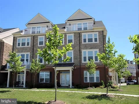 Photo of 42581 Sunset Square, ASHBURN, VA 20148 (MLS # VALO2134448)