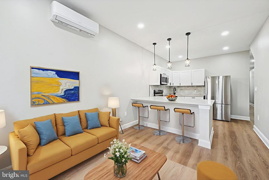 This beautifully renovated duplex at 2917 N 7th Street in Philadelphia’s 19133 neighborhood offers a fantastic owner-occupied opportunity or investment property. The home is welcoming to FHA, VA, Conventional, and cash buyers, making it highly versatile. The first-floor unit features two bedrooms, a full bathroom, a bright living area, a sleek kitchen, and an in-unit washer and dryer, while the upstairs one-bedroom unit also includes its own living space, character details, and a washer and dryer for added convenience. Both units have efficient mini-split heating and cooling for year-round comfort. The backyard, exclusive to the downstairs unit, features a small deck and a mulch patch perfect for gardening, providing a private outdoor space to enjoy. A major highlight is the existing rental income: the bottom unit is currently OCCUPIED and generating $1,500 per month, which is ABOVE market value for the area, adding a strong cash-flow bonus and helping offset carrying costs. With its turnkey condition, rental history, and versatile layout, this duplex is an exceptional opportunity for buyers looking to live in one unit while benefiting from rental income in the other. Schedule your showing today!