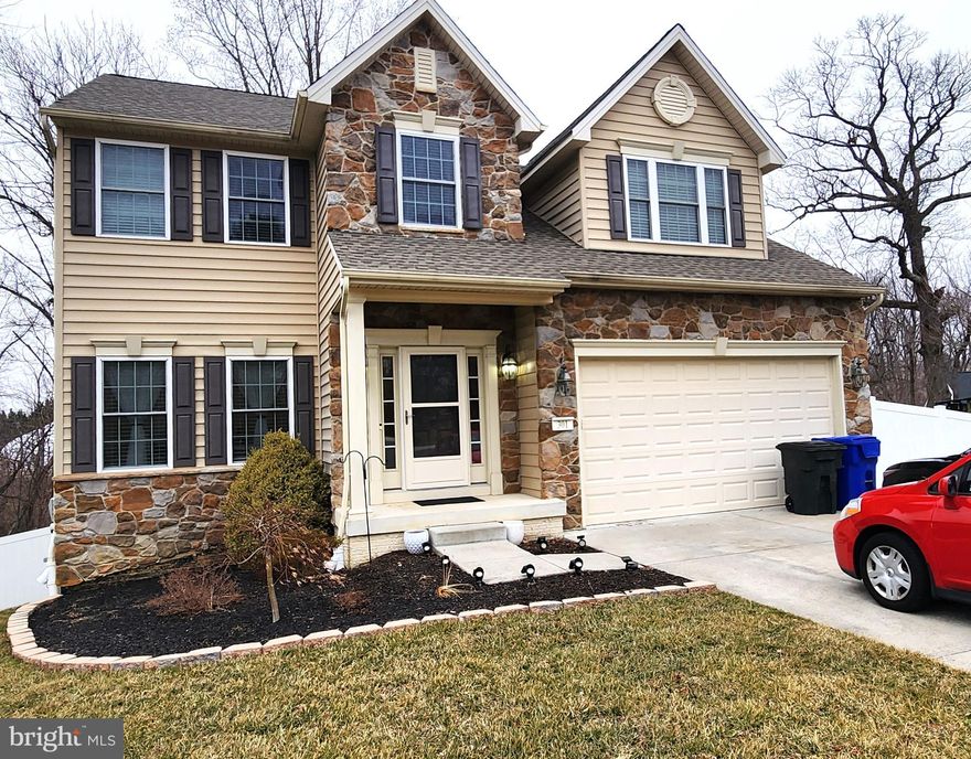 Price reduced.  Welcome home to this beautiful, stone-front colonial situated on a cul-de-sac. The exterior features professional landscaping, a stamped concrete patio to the walkout below, and a six-foot vinyl privacy fence to complete a private backyard and a maintenance-free Trex deck. Fabulous kitchen w/ granite counters, 42" hardwood cabinets, huge pantry, breakfast area & hardwood floors throughout the house on the upper and main floors. Plenty of bathrooms are packed on the upper level, including a primary bath, 1/2 on the main level, and a full bath on the lower level. The main level boasts an elegant formal combo living room and formal dining room accented with/beautiful hardwood floors and recess lighting. Primary suite w/tray ceiling, primary bath w/double sinks, oversized shower w/custom tile work. Large bedrooms! There are tons of closet space! Completed lower level with walkout exit. An enormous recreation room with a walk-out to a patio, a den/library that can be converted into a 5th bedroom, a full bath, a shiny ceramic floor, and additional storage. This property is situated in a well-established neighborhood with convenient access to shopping, dining, and top-rated schools. With a beautiful lot, exceptional interior features, and extensive living space, this home presents a rare opportunity in the heart of Bel Air, Harford County.