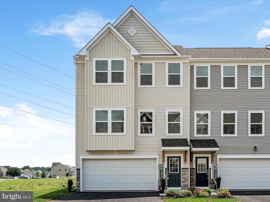 Be the very first to live in this brand-new end-unit townhome in Webber Springs! With over 2,400 sq ft of finished space across three levels, the Maronda St Patrick model townhomes are the largest in Inwood—and this one is loaded with upgrades and extra perks. The entry level features a private bedroom and full bath—perfect for guests, a home office, or a quiet getaway. On the main level, the open floor plan shines with durable LVP flooring, a gourmet eat-in kitchen (complete with quartz countertops, stainless steel appliances, large island, and double door pantry), a Trex deck, a bright family room, and a powder room—making this floor ideal for hosting friends or relaxing after a long day. Even better? This home backs to open common space that will never be developed, giving you more privacy and peaceful views. Upstairs, you'll find three cozy bedrooms with soft carpet, including a primary suite with a rain showerhead and walk-in closet. The laundry room with washer/dryer hookups and generous storage complete the upper level. All this, just minutes from grocery stores, restaurants, and I-81! Making this home as convenient as it is beautiful. 3x rent in monthly income, clean credit and no pets required to rent.