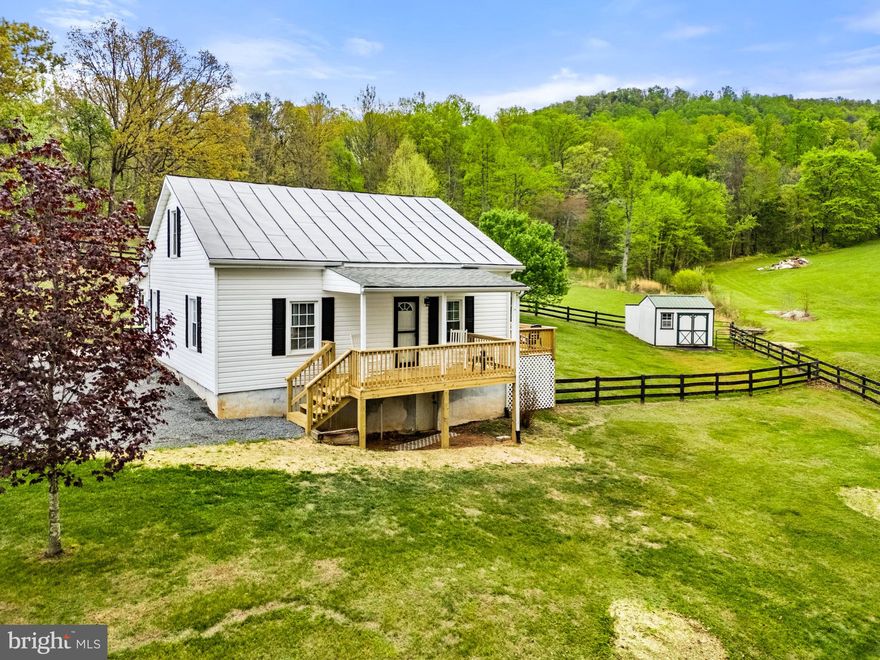 Rare 9.8-Acre Gem – Fully Renovated  Cape Cod Style Farmhouse with No Restrictions!

Experience the perfect balance of country charm and modern luxury on this stunning 9.8-acre unrestricted property. Freshly updated in 2026, this home is move-in ready and offers endless possibilities for animals, recreation, or future investment.

RECENT UPDATES (2026)

Kitchen & Bath: Completely remodeled with modern finishes.
Fresh Paint: Entire interior and exterior freshly painted.
Flooring: Gorgeous original hardwoods throughout; new durable laminate in the mudroom.
Exterior: Brand-new front and side porches; metal roof professionally painted and maintained.

MAIN LEVEL LIVING

Bright and spacious Living Room.
Huge Country Kitchen designed for gatherings.
Two comfortable main-level Bedrooms.
Massive Mudroom/Laundry room—ideal for active country living.
Full remodeled Bathroom.

UPPER LEVEL VERSATILITY

Expansive, wide-open space perfect for a 3rd Bedroom, Home Office, or Studio.
Incredible storage with two dedicated storage closets plus a clothes closet.

THE LAND & POTENTIAL

9.8 Private Acres: Peaceful, scenic views from both new porches.
Unrestricted: Bring your horses, livestock, and 4-wheelers—no HOA!
Division Potential: Buy now and explore the potential to divide and build later.

This property offers the privacy and freedom you’ve been searching for. 
Don't miss this rare opportunity—schedule your showing today!