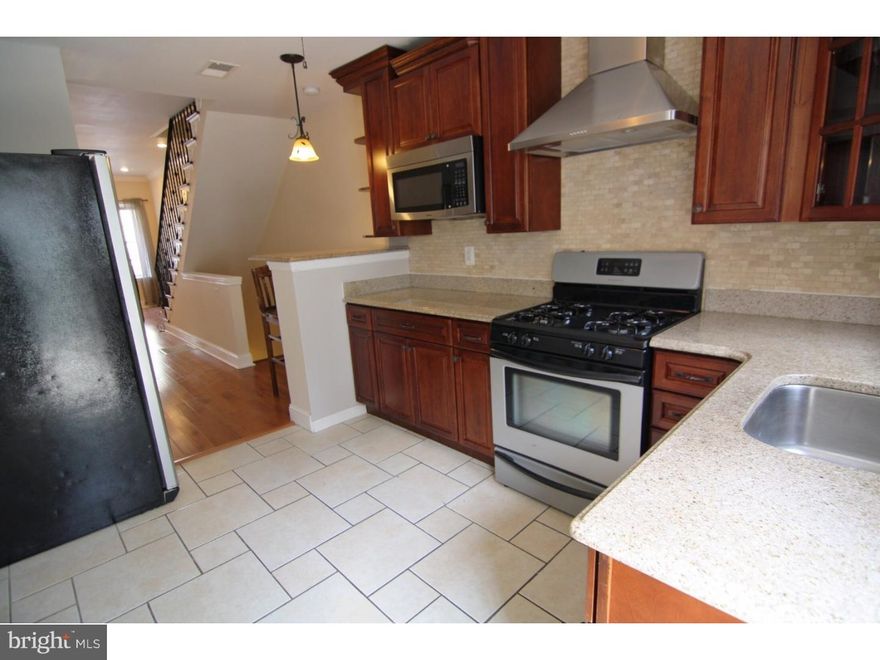 Beautifully Renovated 3 Bedroom 1 1/2 Bath home available for rent! Central air, beautiful hardwood floors in living space, high ceilings. Main level features spacious open kitchen with all stainless steel appliances, granite counter tops, and cherry cabinets, as well as breakfast bar. Step out to a charming rear yard, great for entertaining and grilling in the warmer months. Half bath on main level, large finished basement with washer/dryer. Upstairs find a fully renovated full bath with tile shower and 3 bedrooms each with closet space - two large and size and one would also be great for a home office. Master bedroom feels airy with high ceilings. Close to 95 (Walt Whitman Bridge), 76, and the sport stadiums. Pets considered on a case by case basis with approvl and deposit. First month, last month, and one month s security due to move in, as well as completed background and credit check and proof of income. Tenant responsible for utilities based on usage. Available now for move in. Located on quiet Sheridan Street, at Porter Street between 6th & 7th Streets, just a block and a half north of Oregon Ave for easy access to grocery stores and shopping.