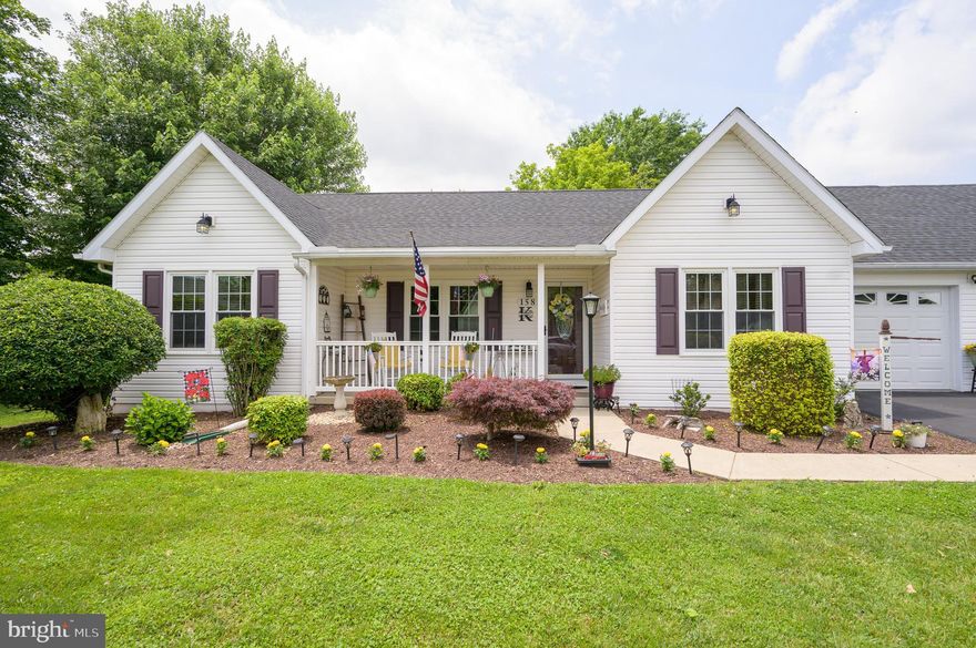 Welcome to this beautiful and well-maintained Rancher Home, located in the Spring Mills Community. This beauty includes a covered front porch for those sunny or rainy mornings, perfect for sipping a hot cup of coffee. The kitchen offers custom crafted Amish cabinets, quartz counter tops, backsplash and smudge less stainless-steel appliances. This inviting home features hard wood flooring throughout the floorplan, excluding the bedrooms which offer carpeting. The living room, boasts cathedral ceilings. As you step into the fenced back yard, you will notice a lovely stamped patio ready for family gatherings. The well-kept landscaping throughout this home genuinely adds peace and serenity. 
This 3-bedroom 2- full baths rancher has much to offer. Have heaps of tools? This oversized 2 car garage has additional storage in the attic as well. The owners most recently updated the smoke detectors and hot water heater. The architectural shingles and HVAC system were also both replaced within the past few years. Take a day off and come explore all of the amenities this community bids, from the swimming pool, tennis courts, tot-lot playground and walking trails. 
A note to add, this property is conveniently located just minutes away from shopping, restaurants, schools and commuter routes. See you soon!