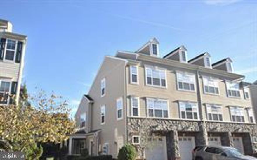 Large/Cozy Luxury 2.5 Level Garage townhouse condo Features 3 Large Bedrooms, 2 Full and 1 half Bath, Luxury Master bath with separate Tub and Shower, Master bedroom with tray ceiling and Walk-in closet, Spacious sun filled living and dining, Nice Kitchen with 42 Inch Cabinets, Raised Corian countertops. Main level hardwood flooring - spotless carpet in all bedrooms. Entrance and garage only on first floor. Walk to major shopping- Costco, supermarkets, restaurants, banks etc- min from I-66, VRE etc. No smoking, requires good credit, clean background and proof of income. Landlord prefers 2+ year lease. Apply on-line