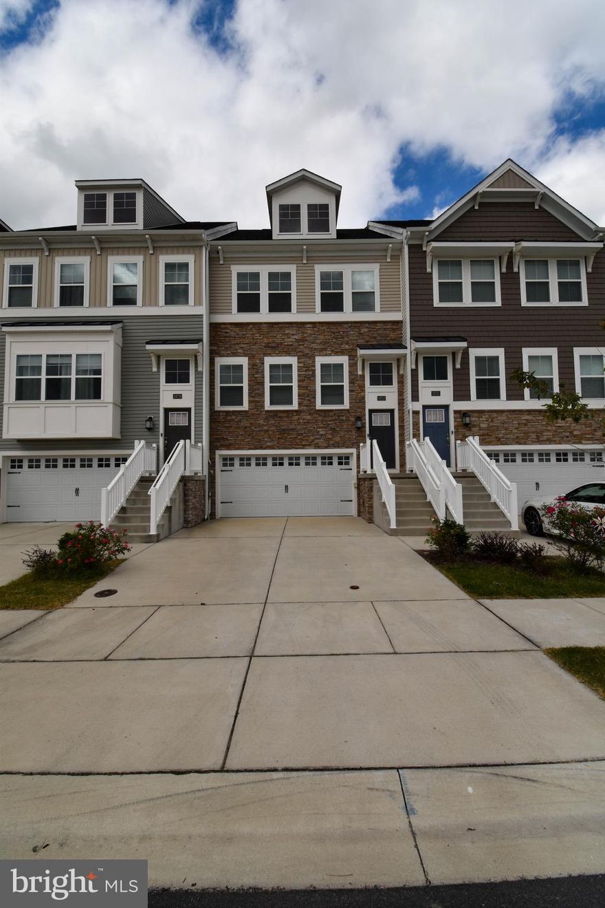 Beautifully maintained 3 bedroom townhome in the amenity rich community of Plantation Lakes. Thoughtfully designed and meticulously maintained, this home offers versatile living spaces and resort-style amenities. Flexible recreation room  on the lower level that is ideal for a home office, playroom, or hobby space with full bathroom also on the same level as well as an attached 2 car garage. On the middle level there is the spacious great room, perfect for entertaining. The gourmet kitchen includes a chef's island, granite counter tops, stainless appliances and a breakfast bar. Spacious primary suite on the upper level includes a walk-in closet, ensuite bathroom with dual vanities and tile shower. Convenience at every turn including the upper level laundry room with easy access to all of the bedrooms. Residents of Plantation Lakes can enjoy an 18-hole Arthur Hills–designed golf course, two pools, two fitness centers, a clubhouse with restaurant and bar, tennis and pickle ball courts, walking trails, playgrounds, and year-round community events. Welcome to Plantation Lakes!