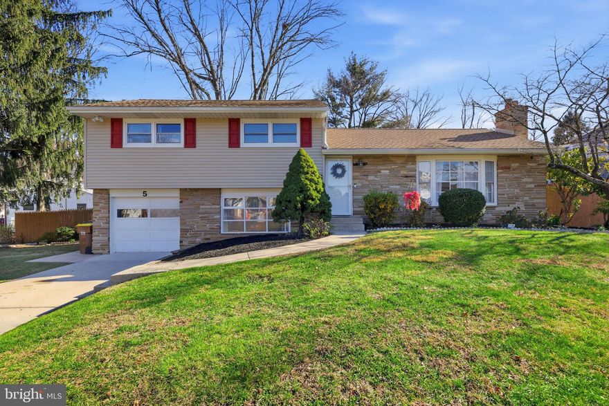 Welcome to 5 Patrick Ln, Yardley, PA—a beautifully maintained home offering exceptional convenience, beautiful updates, and an outdoor oasis perfect for relaxation or entertaining. Ideally located within Lower Makefield Township and the highly regarded Pennsbury School District, this property provides easy commuting access to Philadelphia, Princeton, and New York City, making it an excellent choice for professionals seeking both comfort and connectivity.

HIGHLIGHTS INCLUDE: In-ground pool with new filter, 3 Bedrooms, 2.5 Bathrooms, 1 Car Garage, 0.71 Acres, Unfinished Basement, NEW Roof, NEW Siding, and so much more…

The open-concept main level is warm and inviting, featuring an eat-in kitchen with newer appliances, white shaker cabinets, granite countertops, and an island with bar-stool seating. The kitchen flows seamlessly into the dining room and living room, where a fireplace with propane hook-up adds comfort and charm. Off the dining room is a sliding glass door providing access out to the lovely back yard deck which overlooks the pool. 
The lower level offers a spacious family room highlighted by built-in bookcases and a convenient powder room with large storage closet. From this level, you’ll enjoy easy access to both the garage and the backyard.

Upstairs, you’ll find three bedrooms and generously sized hallway closet. The primary suite boasts an updated bathroom with a stall shower and radiant-heat flooring, while the two secondary bedrooms share the full hall bath. Original hardwood floors are found under the carpeting, offering future potential for refinishing. 

The home is heated very comfortably with baseboard heating off the boiler. An efficient, ductless, split system  provides zoned air conditioning, as well as supplemental heat option in the winter. 

Outdoors, the property shines with a large, fenced in back yard and an in-ground pool—perfect for summer enjoyment. The pool features brand-new filter equipment inside the storage shed, and the home has been upgraded with a new roof and vinyl siding, providing fantastic curb appeal, durability and peace of mind.
