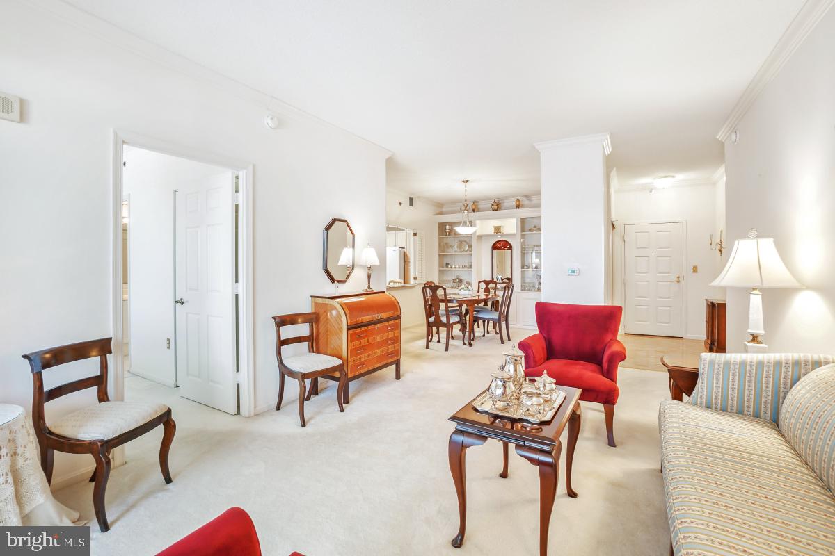 Gorgeous apartment in Vantage Point West, one of the most popular and best-managed buildings in Leisure World, a 55+ active adult community that feels like a resort! This unit is in move-in condition and is certain to impress! The bright table-space kitchen includes maple cabinetry, granite countertops and lots of storage and counter space. There are 2 spacious bedrooms with tons of closet space! The sunroom offers sweeping views has 2 heating and air conditioning vents and is the perfect spot to relax! This apartment boasts a newer washer & dryer and an underground parking space, too! Clubhouse II is next door and includes the indoor pools, fitness center, billiards and ping pong rooms, auditorium and pickle ball courts. Community amenities also include an 18-hole golf course, 2 restaurants plus a pub, an outdoor pool and lanai, art studio, woodworking shop, library, MedStar Health Center directly across the street, 24-hour security and so much more! This condo is a terrific value in today's market!