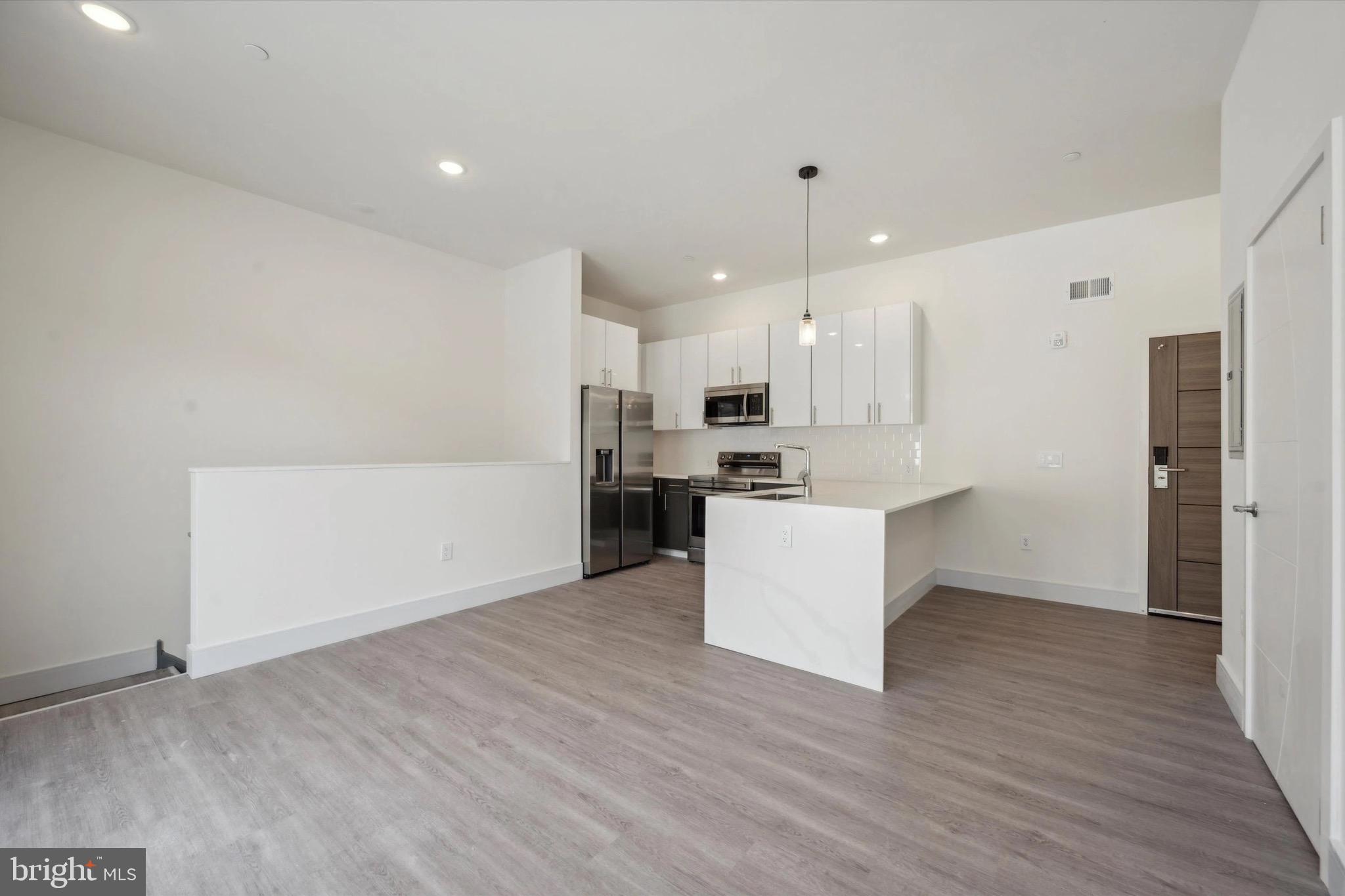 Discover 1221 E Fletcher St, a newly constructed haven boasting 47 stunning apartments. Choose from diverse floor plans, including studio, 1 and 2-bedroom options, some featuring private outdoor spaces. Enjoy the convenience of in-unit laundry, stainless steel appliances, and high-end finishes. Nestled in the sought-after Fishtown neighborhood, you'll find yourself within walking distance of numerous bars, restaurants, coffee shops, parks, and more. Welcome home to contemporary living at its finest. Discover the luxury of unit 107! This spacious 1-bedroom features a bi-level design, private rear patio, wrap-around kitchen, and oversized bedroom – ideal for hosting guests in style!
Promotions: Price is effective rent after a concession amortized on a $1800 lease price.