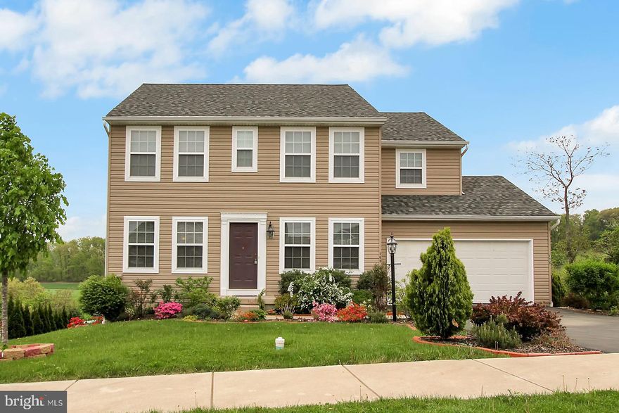 This 2 story colonial is ready for you to make it your new address! Don't let the paint colors fool you, this home is a beauty waiting for your touch  Hardwoods in foyer, dining room, kitchen, living room and family room. 2nd floor has large master bedroom with bath and walk in closet,  2nd floor laundry and 3 more spacious bedrooms. Partially finished walk out basement. Freshly painted deck for summer entertaining! Come see for yourself how you can make this home your own!!