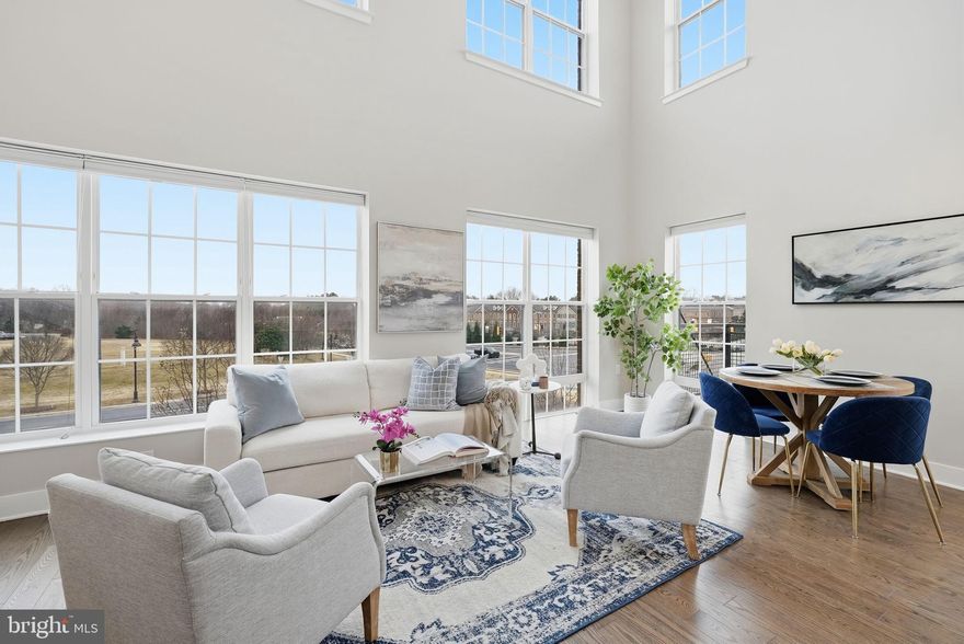 Contemporary Elegance – A beautifully designed 2BR/2BA + LOFT encompassing 1,294 square foot residence in the sought after Crown community. Built in 2019, this sophisticated condominium blends upscale finishes with effortless convenience, offering a refined retreat just steps from the vibrant energy of Downtown Crown.

An open, light filled layout creates an inviting flow ideal for both everyday living and entertaining. Expansive windows frame the space with natural light, while modern architectural lines and quality construction elevate the home’s overall presence. The generous main living area easily accommodates multiple seating zones, with seamless connection to dining and kitchen spaces. Cathedral ceilings with double rows of window allow for endless hours of sunlight during the day.

The kitchen serves as the home’s stylish centerpiece—crafted for both function and beauty—with contemporary cabinetry, sleek surfaces, and stainless steel appliances that complement the modern aesthetic. The large storage closet adjacent to the unit is must-see bonus to owning the home. In-unit washer and dryer for your convenience.

Amenities include spacious exterior common area with comfy sofas and fireplace and grill.  Enjoy the comfort of newer construction systems and materials.  Garage parking, secure building access, and a low maintenance lifestyle, this home offers the perfect blend of luxury and ease.

Located in one of Montgomery County’s most dynamic neighborhoods, you’re moments from award winning restaurants, boutique fitness studios, cafés, grocery options, and the lively Crown and Rio waterfront districts. Quick access to I 270, the ICC, and Metro makes commuting effortless.