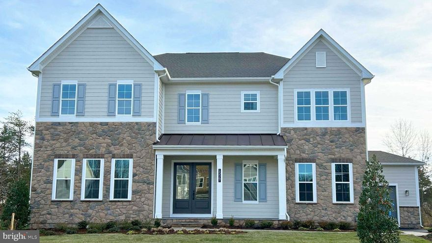 Designed with an extensive grand 2-story foyer, this home plan warmly greets your guests. Complete with dining, foyer, great room, primary bedroom & primary bath tray ceilings, the formal dining and flex room lead you to a spacious beamed ceiling great room, kitchen and first floor bedroom with full bath. The owners entry features built in cabinets and a private entry to the main level bedroom with ensuite full bath.  All bedrooms have their own private baths and walk in closets. The expansive Primary suite has dual walk in closets, sitting area and primary grand bath including a free-standing tub and spa-like shower. This design offers a finished recreation room and the basement bedroom and full bath are complete for your convenience.
Up to $10,000 total closing cost is tied to the use of DHI Mortgage.
*Photos, 3D tours, and videos are representative of plan only and may vary as built.*