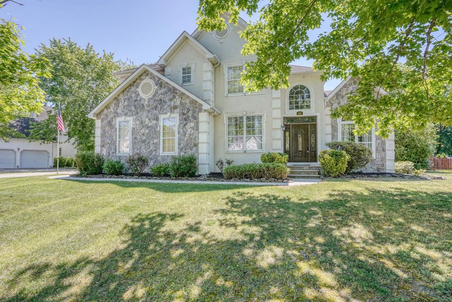 Nestled in the prestigious community of Pleasant Hill in Caesar Rodney School District close to Bayhealth, Dover AFB and Rt 1, this exquisite 4-bedroom, 3.5-bathroom residence with an in-ground pool and backyard oasis offers harmonious contemporary elegance and traditional charm. Spanning approximately 3600 sq ft of finished living space, this home is designed for both comfort and sophistication, making it the perfect sanctuary for those who appreciate the finer things in life. The immediate curb appeal, with a stone front and beautiful landscaping showcase just a small glimpse of how well this home has been maintained. As you step inside the attractive upgraded front door, you are greeted by a warm and inviting atmosphere, accentuated by a two story foyer, rich hardwood floors and model-home-worthy upgraded banister that all add a touch of refinement. A flex room or office to your right and the formal dining room to the left offer versatility. The spacious cathedral ceilinged family room, conveniently located off the gourmet kitchen, is perfect for gatherings, featuring a cozy gas fireplace that creates an inviting focal point for relaxation. The kitchen itself is a culinary enthusiast's dream, boasting gas cooking, upgraded countertops including a luxurious wooden counter with bar seating, a generous pantry, and an eat-in area that encourages casual dining and entertaining. One bedroom is conveniently located on the main level that accesses the first floor FULL bathroom. The upstairs spacious primary suite features an en-suite bath and an oversized walk-in closet that is sure to cater to your storage needs. There are two additional upstairs guest bedrooms with a jack-and-jill full bathroom with dual vanities. Step outside to discover your own personal back yard oasis. The in-ground pool, surrounded by a beautifully landscaped yard, and a 19x17' covered patio invites you to unwind and enjoy sunny afternoons in resort living fashion. The expansive lot is entirely enclosed by a recently updated wooden fence, giving peaceful backyard privacy. The partially finished basement offers a half bath and ample space for endless possibilities, whether you envision a home gym, a media room, or additional storage. With luxury features and thoughtful design, this home has the perfect balance of indoor and outdoor living, where every detail has been meticulously crafted to create a true sense of home. The owner made countless thoughtful, high-end updates making this a rare find. Come see for yourself! Schedule your private tour today.