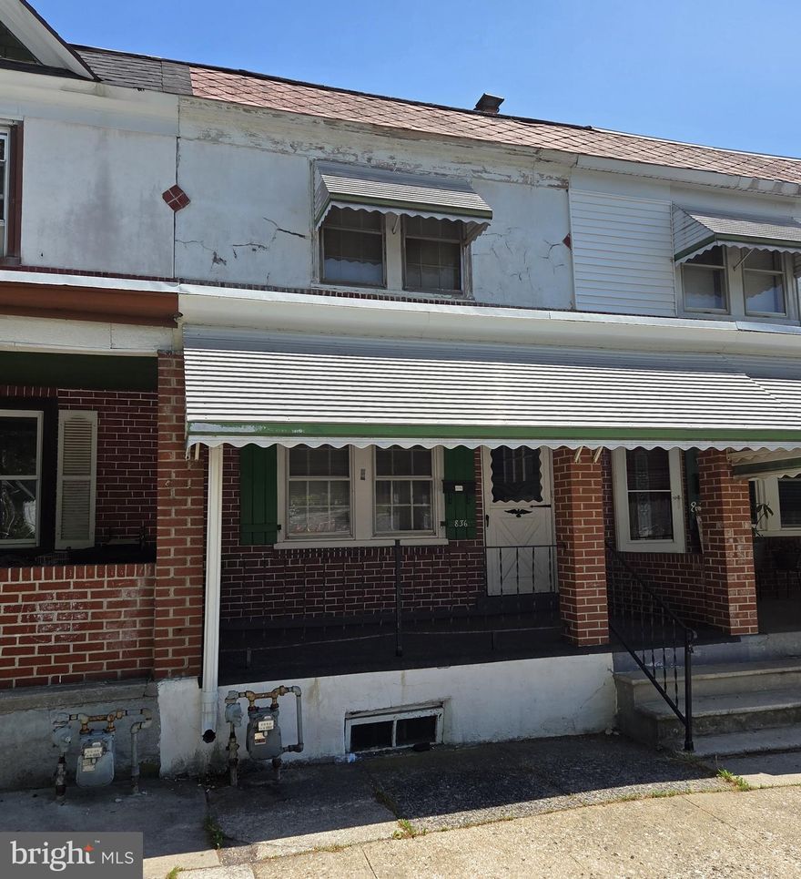 Property is in need of complete renovation.  New gas heater in 2024 or 2025, covered front porch, off street parking.  Washer, dryer and refrigerator included "as-is".  Sale will be CASH ONLY.  Include in AOS that sale is  "as-is" condition, buyer at buyers expense to obtain Use and Occupancy from the municipality of Norristown and Buyer will accept any personal property in the house at closing.  Washer, dryer and refrigerator included in sale.  Off street parking.