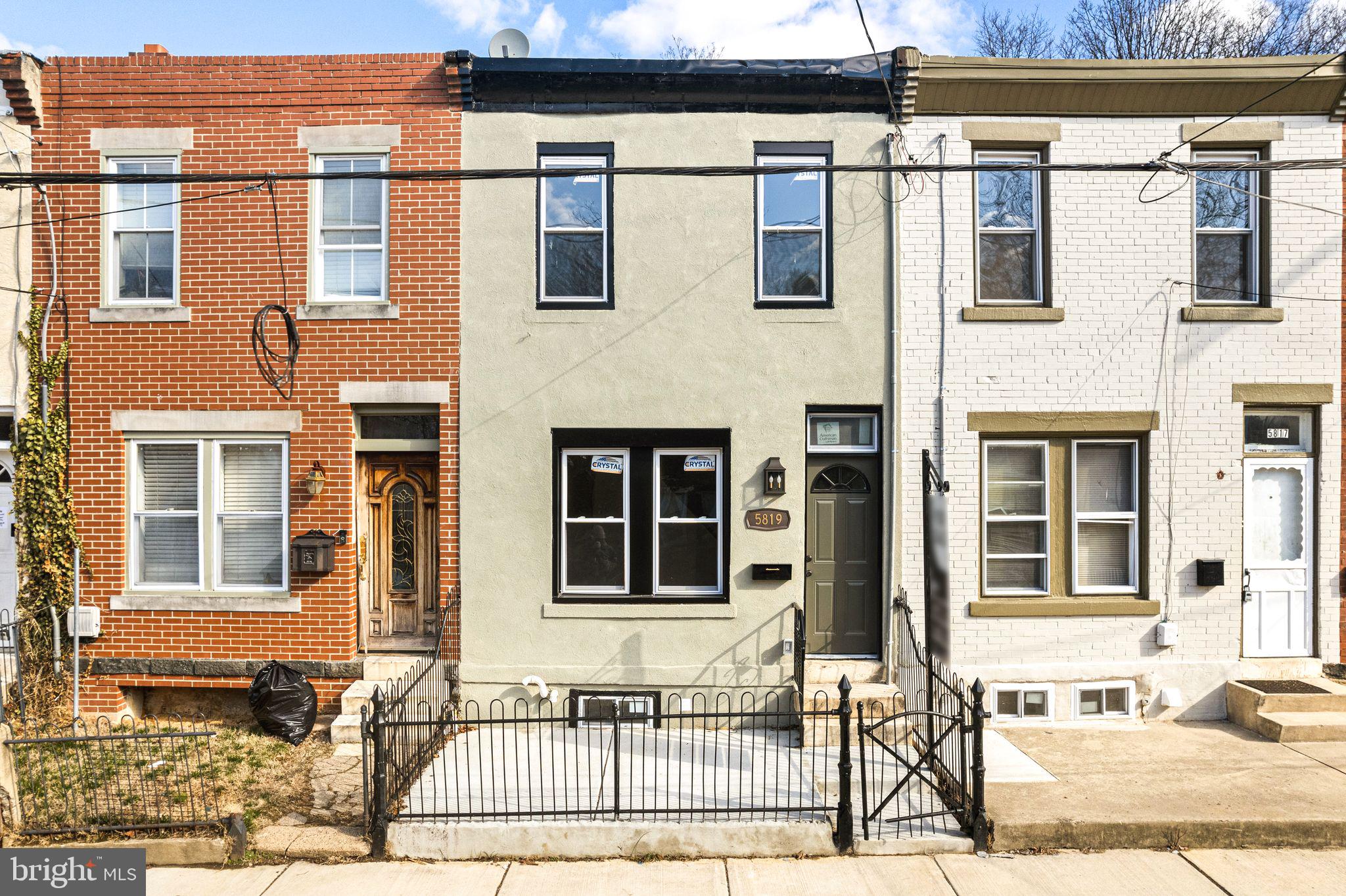 Charming & Fully Renovated 2-Bedroom Row Home with Modern Upgrades! Welcome to this beautifully updated 2-bedroom, 1-bathroom row home, nestled on a well-maintained block with a gated front porch and convenient street parking. Step inside to discover an inviting open-concept living room that seamlessly connects to a spacious dining area, perfect for entertaining. Just beyond, the brand-new kitchen has been fully rebuilt, boasting sleek new cabinetry, top-of-the-line appliances, and a vaulted ceiling that enhances the space with natural light. Through the back door, you'll find a private fenced-in patio with gated access to a charming community garden—ideal for relaxing or enjoying some fresh air. Upstairs, the primary bedroom sits to the left, with a cozy secondary bedroom to the right. A beautifully renovated full bathroom completes the upper level, featuring modern finishes and high-quality craftsmanship. This home has been meticulously upgraded with a new roof, a waterproofed basement, a brand-new central air HVAC system, a new hot water heater, new windows, and updated plumbing—providing peace of mind for years to come. Located just steps from Ultimo Coffee Shop and offering easy access to public transportation, this home ensures a stress-free commute while placing you near one of the best cafés in the area. Don’t miss your chance to own this move-in-ready gem!