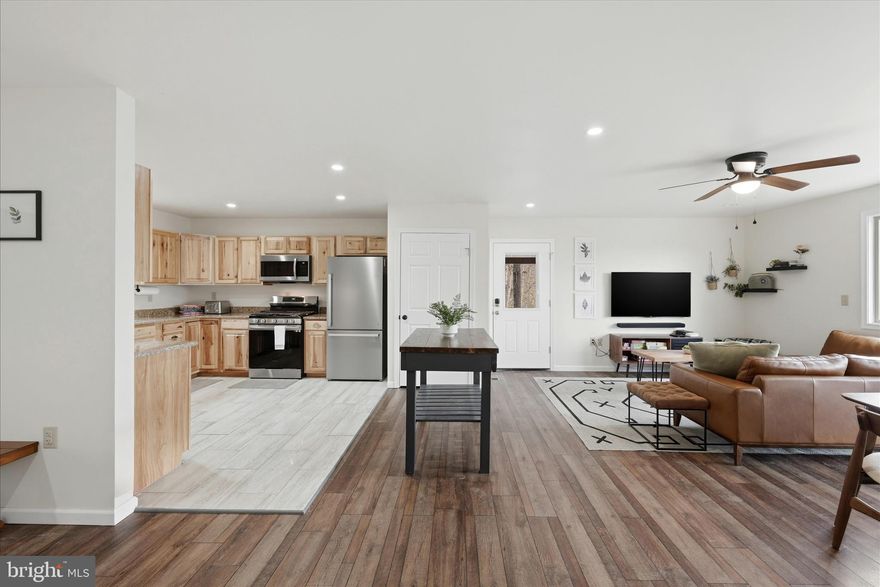 Tucked into the peaceful woods of Supinlick Ridge at Bryce Resort, this 4-year-young custom log cabin offers the kind of mountain escape outdoor lovers dream about. With 3 bedrooms, 2 baths, and 1,320 square feet of single-level living, this home blends rustic charm with modern comfort — and it’s being offered fully turnkey as a successful Airbnb investment property.

Step inside to find warm wood finishes and a thoughtfully designed kitchen featuring beautiful hickory cabinetry and generous counter space, perfect for hosting family gatherings or guests returning from a day on the mountain. The open layout makes the home feel inviting and connected, creating the ideal basecamp for adventure.

Outside is where this property truly shines. The carport easily transforms into a covered outdoor entertaining space — simply pull the vehicle out and you have the perfect spot for grilling, gathering, or relaxing after a day on the slopes or trails. Enjoy quiet mornings on the front porch, or spend your evenings on the 10’ x 12’ back deck watching wildlife pass through the trees, with seasonal mountain views peeking through in winter.

Located just minutes from the heart of Bryce Resort, the property puts year-round recreation at your doorstep. Spend your days skiing, snow tubing, golfing, mountain biking, swimming, playing pickleball or tennis, or relaxing by the lake. Bryce also offers a dog park, local airport, library, and a vibrant summer farmers market every Wednesday. Just 10 minutes away, the historic village of Orkney Springs hosts live concerts and seasonal events, adding even more charm to the area.

Despite feeling worlds away, this mountain retreat is an easy drive from Washington, D.C. and the Northern Virginia suburbs, making it a perfect weekend escape or high-performing short-term rental for travelers seeking nature, adventure, and a peaceful cabin experience in the Shenandoah Valley.

Whether you're looking for a personal mountain getaway, an income-producing Airbnb, or both, this Bryce Resort cabin is ready to welcome its next chapter — and its next guests.