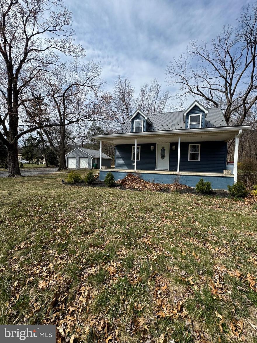 Nestled in the trees, this cozy 1-acre property offers a peaceful retreat with all the comforts of home, just outside the historic town of Mercersburg and close to the convenience of Whitetail Ski Resort. Enjoy the tranquility of a quiet road and a spacious yard perfect for outdoor activities. The upgraded kitchen boasts sleek granite countertops, stainless steel appliances, and plenty of storage space. A convenient mudroom and laundry area are located on the first floor, with easy access to the bright and airy sun porch – an ideal space to relax and enjoy the surrounding nature.
The 1-floor bathroom features a walk-in shower and an oversized sink cabinet for added convenience. Upstairs, you'll find two cozy bedrooms perfect for rest and relaxation. The home also features a partial unfinished basement offering additional storage space or potential for customization.
With a 2-car detached garage and a small shed for storage, there’s plenty of room for all your tools and toys.
This home is perfect for those seeking a quiet, country setting with modern updates and easy access to nearby attractions like Whitetail Ski Resort. Don’t miss the opportunity to make this charming cottage your own!