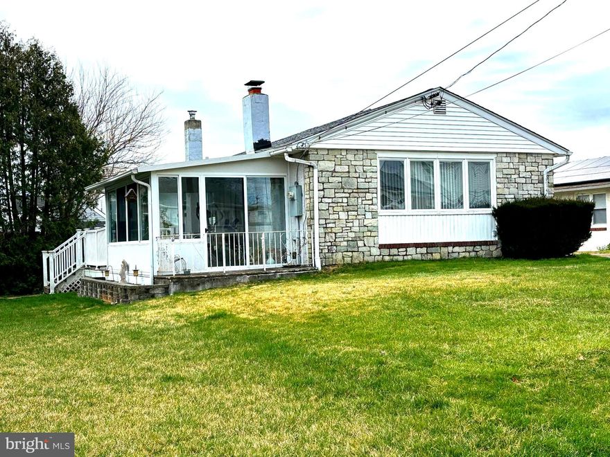 Here is your chance to own a single home in the beautiful West Torresdale neighborhood.  This is a lovely rancher with a welcoming and spacious living room with wood wood-burning stone fireplace, a Formal dining room and eat in modern kitchen with white cabinets, and an exit to an enclosed 3  season sun room with an outside deck.

Originally built as 3 bedrooms-Master bedroom was expanded with a sitting area or office space.  2nd bedroom and 3 piece hall bathroom on the main floor, Laundry. The downstairs has a large family room, storage, and utility room. New water heater
The roof was replaced in 2021. Radon Mitigation system added in 2011 by prior owner

Easy to show call for appointment today.