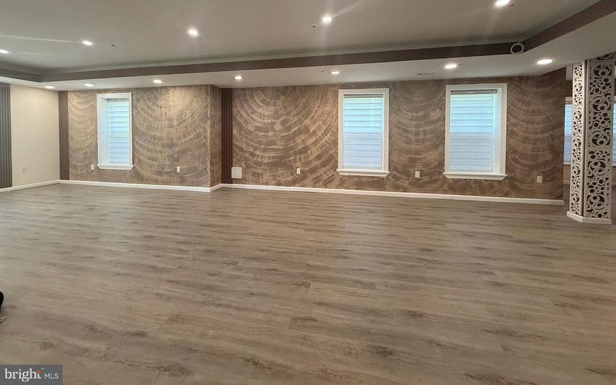 STUNNING 3000+sq ft custom designed appointed BASEMENT with contemporary flair awaits a responsible renter to enjoy the tranquil setting in sought after Clifton.  It is very conveniently located and just minutes from Fairfax and Centreville. Also an  easy access for students at George Mason University!
It is  less than 2 miles from all major routes ( Fairfax county pkwy, Rt 28, Rt 29, Rt 66), close to Fair Lakes shopping center, Fair Oaks mall and yet secluded in a private feel ambiance. The layout is a  gorgeous  one floor living with 2 large rooms, 2nd room could be the office/den or a potential  2nd bedroom, large walk out closet, 1.5 bath with state of the art modern fixtures and tile flooring and walls, kitchen with quartz countertops and breakfast bar with a separate dining area. The  spacious family room has tray ceiling with floating mantle fireplace and large TV  mounted on the wall to convey with  WiFi available.
Also, exquisite brand new sleek zebra blinds in neutral colors thru out.
Fully equipped with brand new stainless steel GE appliances in the kitchen and laundry room. Private entrance and driveway parking for (2) spaces available.
 A rare rental opportunity to enjoy this unique, serene and fabulous property!