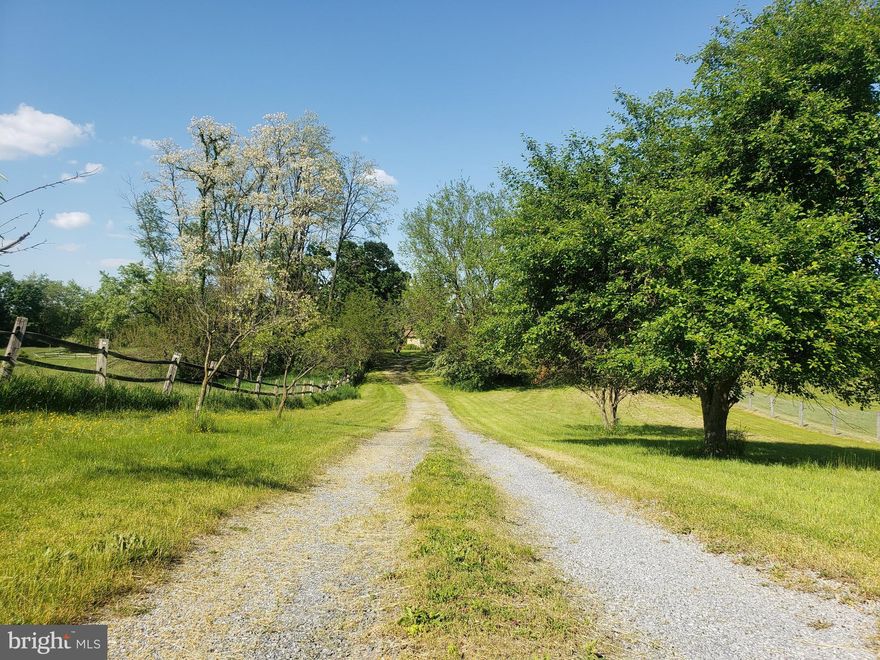 If you were dreaming of owning a piece of paradise located near town but secluded, private and surrounded by the beauty of nature, look no further. This 3 bedrooms, 2.5 baths, 2 car garage ranch style home is situated on over 6 fenced in acres of land with serene views that may take your breath away. Open floor plan concept, beautiful hardwood floors, lots of natural light are only some of the amazing features of this hidden gem! Added bonus is a large sunroom for your seasonal enjoyment.  Basement utilized for additional storage.  A barn perfect for your horses or other animals/livestock. Be sure to schedule your personal tour of this property to trully appreciate it's beauty.