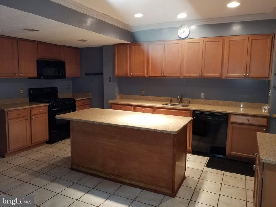 BEING SOLD AS IS.  Spacious 3 Bedroom/ 2 Bath row home in Dundalk covered front porch and fenced in Backyard. Come unlock the potential in this hidden gem!! Largest on the street with 14x14 main level family room/ Living room.