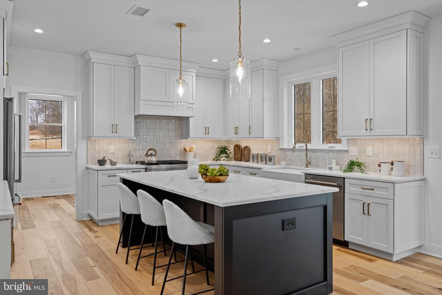 Move-In Ready! Enjoy quiet luxury living in a brand new semi-custom home! The only brand new estate homes on the largest homesites in Downingtown school district. Foxlane Homes' designer-built and crafted Georgetown features 4 bedrooms, 3 full baths, 2 half baths, over 4,800 square feet, and a 3-car side-load garage, all set on a private wooded homesite.

The foyer welcomes you with a flex room, perfect for a home office or study, and a dining room designed for entertaining family and friends. The upgraded professional kitchen showcases KitchenAid appliances, including a French door refrigerator, double oven, drawer microwave, and upgraded range hood—ideal for the ultimate chef. Just off the kitchen are a family entry and a walk-in pantry for added convenience.

The open-concept first floor also includes a great room with a gas fireplace and a sunroom for enjoying all four seasons. Exterior highlights include a bluestone front porch and a composite rear deck, perfect for outdoor living.

The owner’s suite is truly exceptional, featuring a cathedral ceiling, owner’s retreat ideal for an expansive walk-in closet or sitting area, and a spa-like bath with its own cathedral ceiling, tiled walk-in shower, and dual vanity.

The finished basement offers additional versatile space—perfect for movie nights, crafting, or a home gym—and includes a powder room. Enjoy hardwood flooring throughout the first floor, second-floor hall, and owner’s suite, along with oak stairs and 9-foot ceilings throughout this luxurious home.

All of this ready to enjoy now—but only while this rare opportunity lasts. Schedule a tour today with a Foxlane Representative to start living the quiet luxury lifestyle. Decorated photos are for representative purposes only. Pricing and savings are subject to changed and tied with our preferred mortgage broker and title company. See Sales Representative for more details. 

 Introducing The Estates at Stonecliff, a serene neighborhood of 36 luxury homes set amongst the rolling hills of Wallace Township. These new homes in Downingtown School District will be set upon spacious estate homesites and feature 4-6 bedrooms, 3.5-6 bathrooms and 3-car side entry garages. Foxlane Homes unmatched customization opportunities allow you to create a space that is uniquely yours, perfectly designed to suit your family’s needs and lifestyle.
Enjoy the peaceful surroundings of the Chester County countryside in a new home with close proximity to the many amenities of Downingtown, Chester Springs and Exton, and easy access to Route 100 and the Pennsylvania Turnpike.