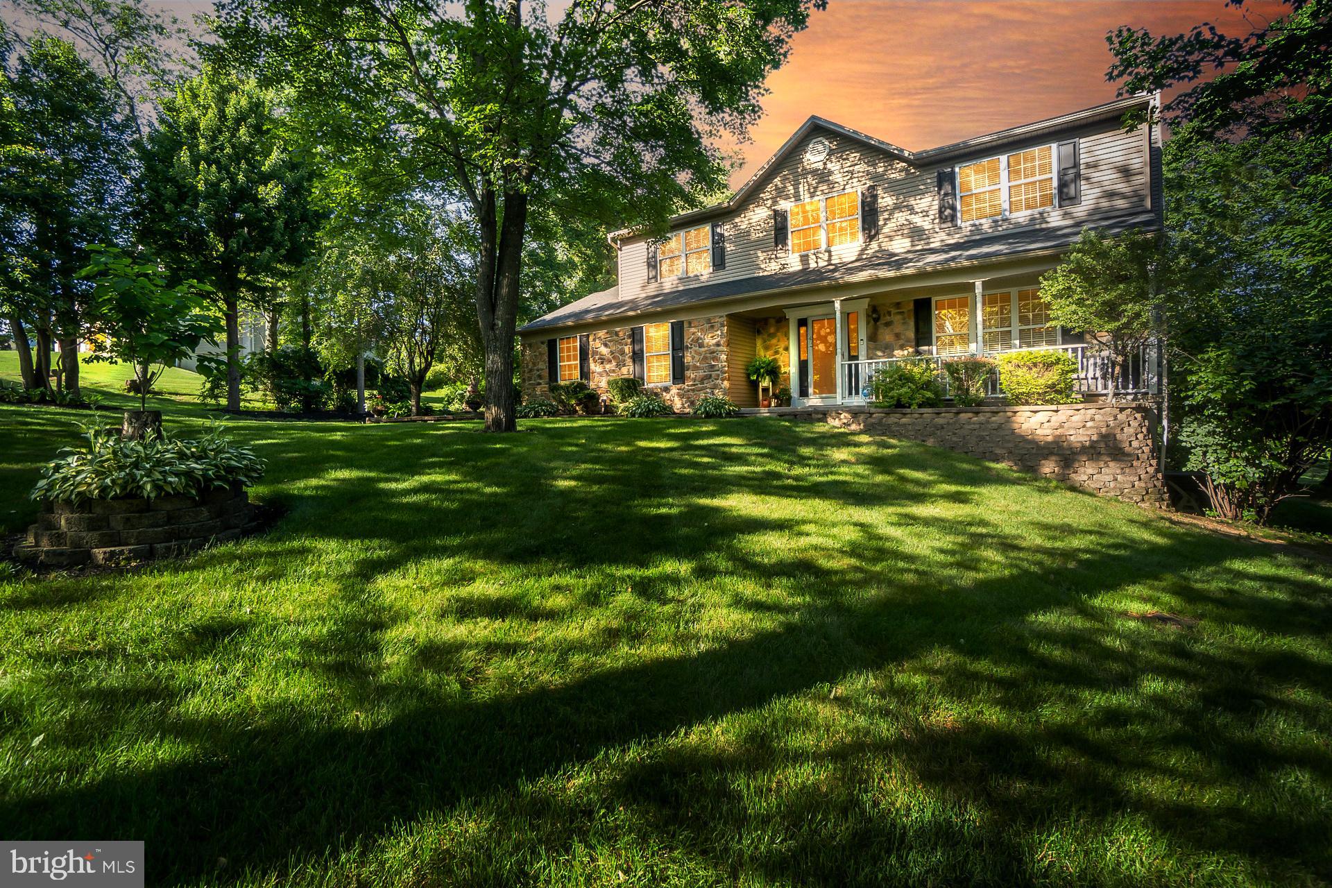 Welcome to this stunning 4 BR, 3.5 bath contemporary home in the highly desirable Laurel Ridge neighborhood of Towamensing Twp! Ideally located just seconds off Route 209 and only minutes to PA Turnpike & Rt 248, making commuting a breeze. Step outside to your own private backyard oasis featuring a beautiful inground pool with spacious patio, a large partially covered deck, tranquil pond, storage shed, and impressive landscaping and hardscaping with mature trees throughout. A large paved driveway leads to the 2-car attached garage, providing ample parking, along with a charming covered front porch. Inside, you're greeted by a tiled entryway and a formal dining room with hardwood floors, which flows into a cozy sitting room featuring a wood-burning stone fireplace. The well-appointed kitchen boasts a center island with seating, tiled floors and backsplash, and abundant cabinet and counter space, open to a sunny breakfast area with deck access. The main level also includes a family room, half bath, and convenient laundry/mudroom. Upstairs, the spacious primary suite offers an 8x8 walk-in closet and private bath with deep soaking tub, tile surround, and a stall shower. Three additional bedrooms and a second full bath complete the upper level. The walkout basement features a massive finished family room with propane stove and a full bath with stall shower—perfect for guests or additional living space! Home Warranty included in sale!
