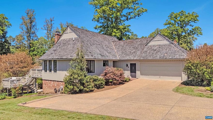 Nice House. Good Design. Great Location. Open Floor Plan. Hardwood floors.  Lots of built-in cabinets. Wine rack. Bar with glass racks. Cabinets and shelves in the brick floored Sunroom. Laundry room with large built in shelves for pantry items. And a closet. Large sink. Each bedroom has it's own full bath. VAST Primary has 2 walk in closets and built-in shelves. Nice office with brick floors. HUGE amount of storage with two walk in attics accessed from the Upstairs bedroom. And built in shelves in both bedroom and walk in closet. Terrace Level is massive. Same sq ft as the main level. Bedroom. Family room with bar area. Exercise/Game room. Wool carpet in the whole area. And a large storage room with built in shelving. Large garage with shelving, closet and pull down attic access. Geo thermal Heat Pump plus boiler and whole house generator. Great patio on the terrace level. Landscaped AND a shed.,Solid Surface Counter,Wood Counter,Fireplace in Great Room