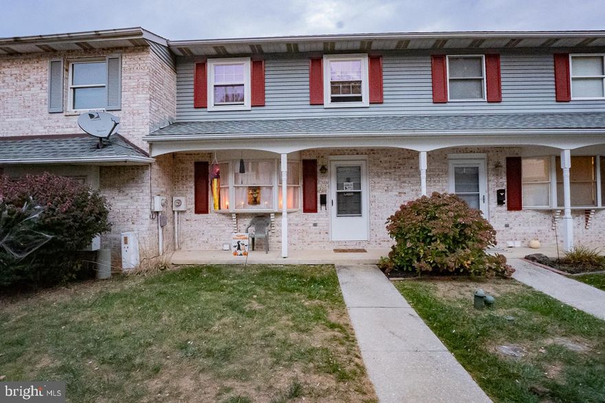 Welcome to 126 Village Drive! This well cared for 2 bedroom townhome is located in the Indian Springs community. Enter the lower level into a large bonus room with gorgeous built-in shelves which are fantastic for extra storage.  You will also find a utility/laundry room. On the main floor there is a combination Kitchen/Dining which is great for entertaining. The kitchen includes a  tiled backsplash, stainless steel appliances as well as laminate wood flooring.  In the dining area you will see large doors that lead to  the covered back deck. A convenient, updated powder room is also located on the main floor. Upstairs you'll discover a spacious Primary Bedroom with laminate flooring and plenty of closet space, a second bedroom with double closets, plus a beautifully updated full Bathroom with tilework, and a  large double vanity. Nothing to do but move in! Do not wait! Schedule your showing today!