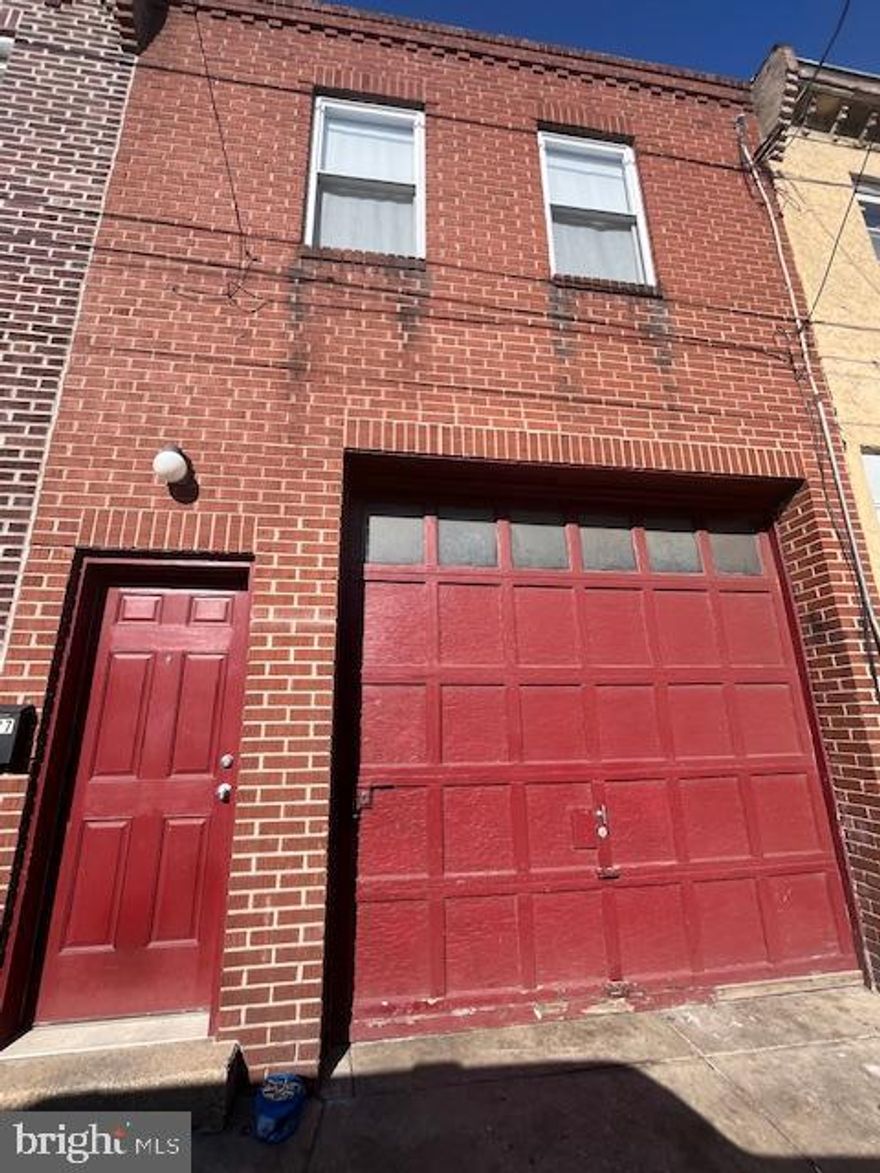 Unique investment opportunity in South Philadelphia featuring a multi-car garage and a second-floor apartment, both currently tenant-occupied, offering immediate rental income. The garage accommodates approximately four vehicles and provides strong income potential, with estimated rental income of $800–$1,000 per month (buyer to verify).

The second-floor apartment was remodeled in 2019 and includes updated roof, HVAC and a water heater. Estimated rental income for the apartment is $1,200–$1,400 per month (buyer to verify). The unit offers a functional layout with ample storage and closet space, an eat-in kitchen with granite countertops and tile backsplash, newer appliances, gas range, hardwood floors throughout, central air conditioning, and recessed lighting.

Tenant is responsible for all utilities except water and provides their own washer and dryer. Property presents an excellent opportunity for investors seeking a well-maintained, income-producing asset in a South Philadelphia location. All measurements, rental amounts, and property information are approximate and subject to buyer verification.