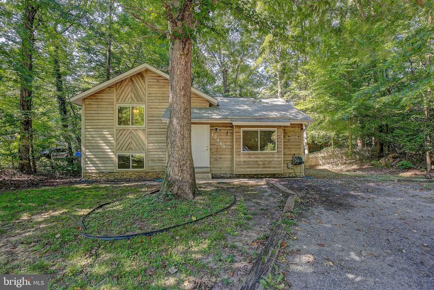 What a great home to make your own!  This lovely split level is freshly painted, new carpet, and power washed for you!  Desirable 3 bedroom 3 bath split level offers so much living space and is great for a growing family!  The open kitchen and living room are a nice feature for your day to day. Head downstairs for the perfect place to have all of your entertainment needs.  Spacious enough to divide the room into a multi-use space, place for the toys and your big screen tv!  The upper level offers you 3 good sized rooms and 2 nice bathrooms. Take a look at the HUGE back yard and it is fenced as well!  Let the kids and pets run free and play all day long.  Private yard with no houses on top of your yard.  This home is in great condition and with your very own updates and finishes this home will create equity for you! Location is great on the main road so it is easy to get in and out of the neighborhood.   Easy to get to the lake or the beach. Great home now it is time to make it yours!