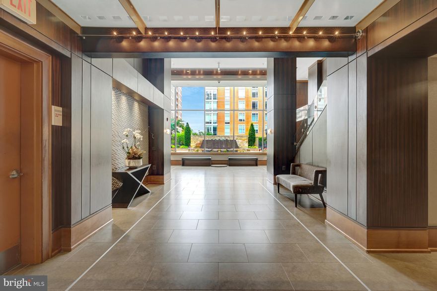 Stunning 2BD|2BA, 2,075 Sq Ft Penthouse in the Heart of Reston Town Center. Midtown at Reston Town Center is an amenity-rich, luxury high-rise condominium, right in the center of it all - with parks, trails, casual and chic restaurants, high-end and convenience shops, ice cream shops, a movie theater, an Apple store, as well as annual art shows and skating in the winter! 

The expansive unit features floor-to-ceiling windows and a large, private balcony, offering sweeping views from the 21st floor. The open floor plan, with wide-plank black wood floors, showcases this casually elegant space with multiple spaces for entertaining, lounging by the fire, enjoying cocktails with a view, or hosting movie and game nights. The gourmet kitchen, opening to a dining area and butler’s pantry, is truly the heart of this home, with plenty of warm natural wood cabinets and drawer storage, honed granite countertops, and a center island with breakfast bar. High-end appliances include a Viking six-burner range with range hood, Viking Professional wall oven and warming drawer, Miele refrigerator and separate, stacked Subzero freezer drawers and an under-counter beverage cooler. The primary suite offers two closets with custom organizers and an ensuite bathroom with dual sink vanity, private water closet, soaking tub and separate walk-in shower. 

A second bedroom, second full bath, a home office and laundry complete the space. Two deeded garage parking spaces come with the unit. The luxury resort-style amenities include a beautiful pool with loungers, umbrellas and a lifeguard on duty, state-of-the-art fitness center, game room, private movie theater, party/conference room with catering kitchen, a lending library, two guest suites, and an exceptional concierge team available 24/7. Reston Metro station and buses are just minutes away and Dulles Airport is just 4 miles away. Luxury and convenience - in a prime location!