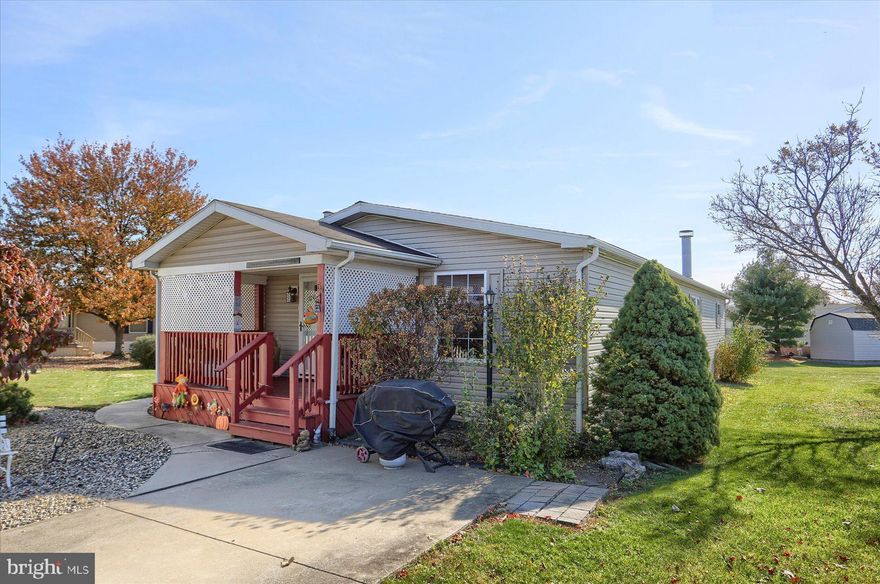 Welcome to this Beautiful 2001 Pine Grove built, Double Wide Home! Enjoy single level living! You will feel like your on vacation everyday in this lovely Home, tucked away in a private setting on a Cul de sac in the desirable Shadowstone Village 55+ community. 
This Home offers 3BR, 2 Full BA, a Laundry area w/Washer & Dryer, large open Kitchen, laminate flooring & ceiling fan, large Dining room which leads to a huge Living Room with a captivating mountain stone electric Fireplace, then enter into the Master Bedroom where you will find a large master en suite and a 13x5'5 walk in closet! 
Enjoy relaxing on the front covered Deck or entertaining family in the yard! This great Home is in Turn Key condition with some minor updates. Per the previous owner the Roof and Deck are approximately 8 to 10 years old and the Water heater is about 6 years old. This is a great Home for a great price!