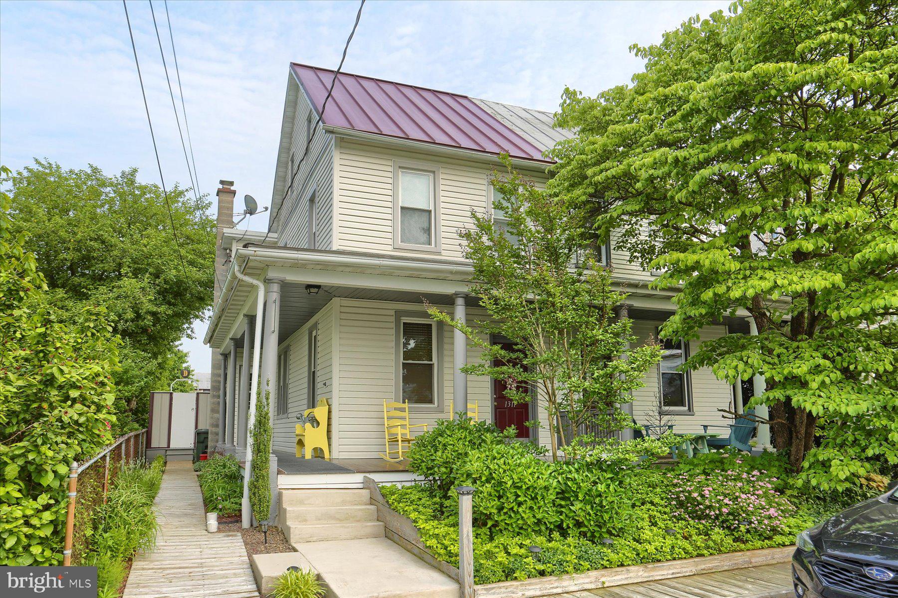 Welcome to 1311 Church Street – where pride of ownership shines inside and out! Lovingly maintained by the same owners for the past 40 years, this charming 3-bedroom, 1-bath semi-detached home offers both character and comfort. One bedroom is conveniently located on the first floor, making it ideal for guests, a home office, or main-level living.
Step into the spacious kitchen featuring plentiful storage, perfect for everyday living or entertaining. The bathroom is finished with beautiful real oak trim, adding a warm and natural touch. Throughout the home, all flooring has been replaced during ownership, and all windows have been upgraded to energy-efficient double-hung style for enhanced comfort and curb appeal. In addition, the owners are including the refrigerator, washer, dryer and a/c window units to convey with the property. The front door has also been replaced with a sturdy metal door featuring a magnetic seal for security and energy efficiency. A durable metal roof, installed in 2013, offers long-lasting protection and peace of mind.
Enjoy mornings on the elegant mahogany front porch—crafted from wood known for its longevity and timeless charm. Out back, the extensively hardscaped yard is a true retreat. The fully fenced-in yard—enclosed with sleek and durable metal fencing—features a composite deck, above-ground pool, garden shed, mower shed, and a detached one-car garage with a workshop and overhead storage.
This meticulously cared-for home is a rare find, offering thoughtful upgrades inside and out. Schedule your private showing today and experience the exceptional value and comfort of 1311 Church Street!