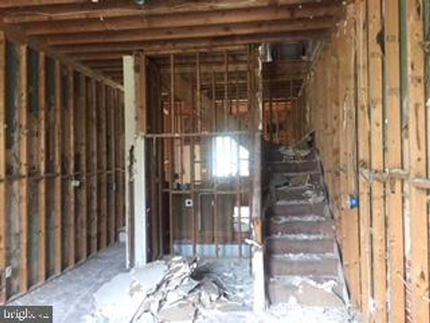 Fixer upper. Make it ready for your own home or as a rental property.  Property has some framing done.  No Contingencies.