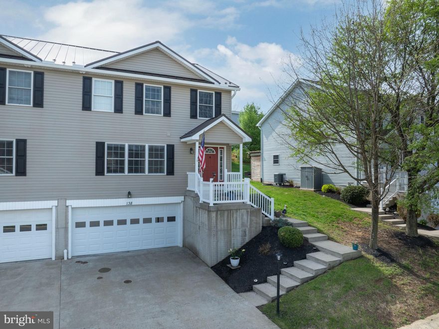 Conveniently located with easy access to I-99, this spacious condo offers quick commutes to PSU, State College, and Bellefonte. The bright main level features a large welcoming foyer, arched wall openings, an eat-in kitchen with a large island, and a comfortable family room with a corner gas fireplace. Step through the glass door to the rear patio that is perfect for grilling and outdoor entertaining. Upstairs, enjoy a convenient laundry area and a roomy primary suite with a walk-in closet and full bath. The lower level includes a clean two-car garage plus a versatile bonus room ideal for a workshop, storage, an exercise space, or hangout area. Enjoy beautiful mountain views, a nearby walking path and park, plus the peace of mind of a new roof installed in 2025. This move-in ready home offers comfort, convenience, and low-maintenance living in a desirable location. Come take a look!