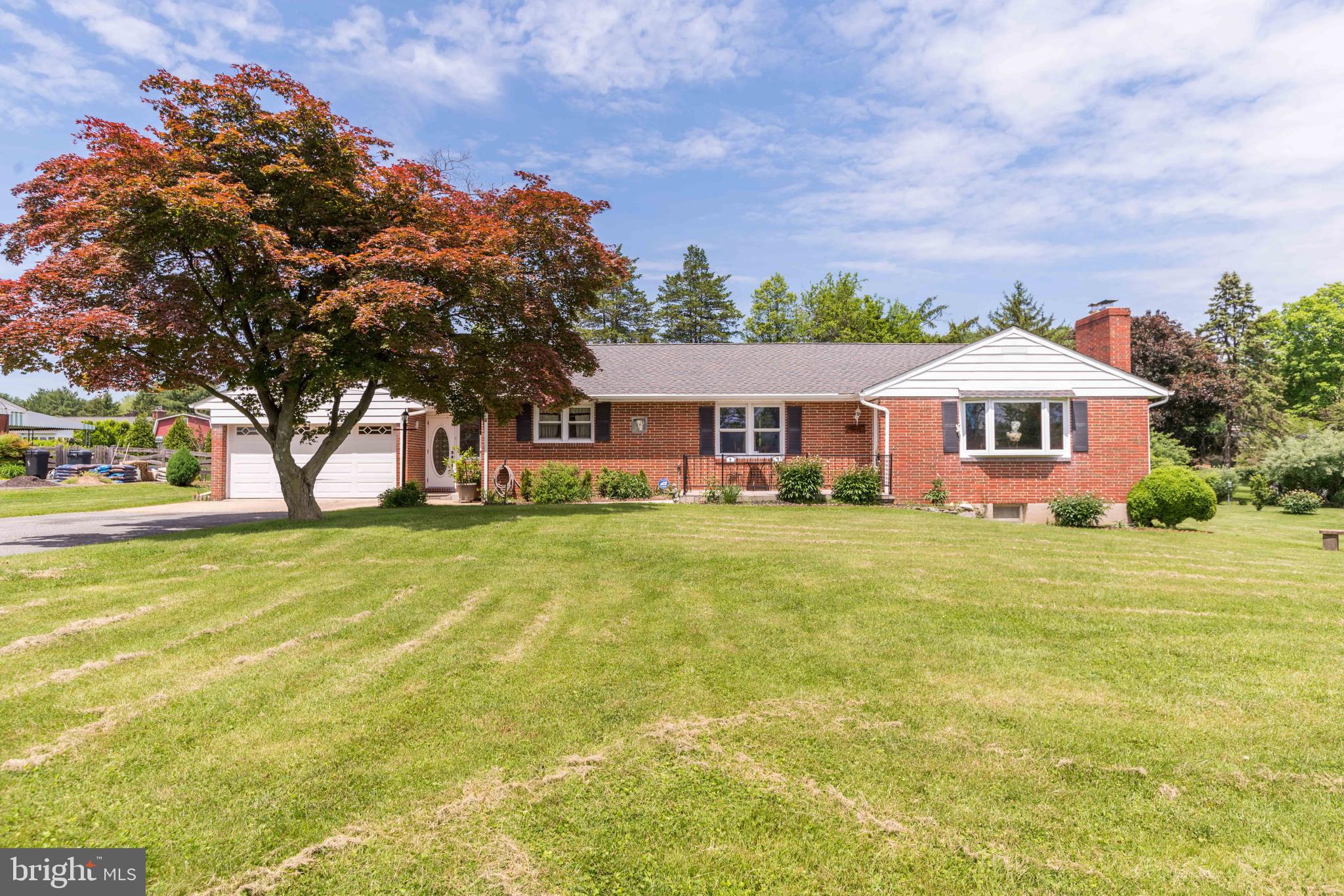 Endless possibilities await you in this large brick rancher in the heart of true Perry Hall. Half acre lot in quiet community surrounded by Gunpowder State Park; good flat space for garden, play, you name it! Enjoy the one level living afforded by the spacious main level. Living room with a fireplace to warm you on those cold winter nights. Three well appointed bedrooms featuring a nicely sized master bedroom. Open kitchen area with space for seating. Step out the back door to spend time on your large open patio area overlooking the rear yard. Lower level is full of options with a nicely finished main area, full bathroom, and space for storage and/or a workshop. Escape the noise without sacrificing the commute!
