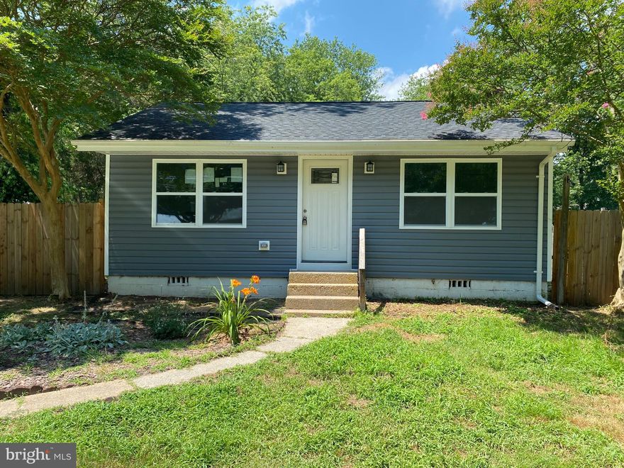 Total renovation in 2021 with plumbing, electric, HVAC and building permits. New roof, siding and windows.  New tile and flooring in both full bathrooms, as well as new vanities and fixtures. Recessed lighting throughout house. Large rear yard for entertaining. Close to marinas and waterfront dining. Easy access to Annapolis and D.C.