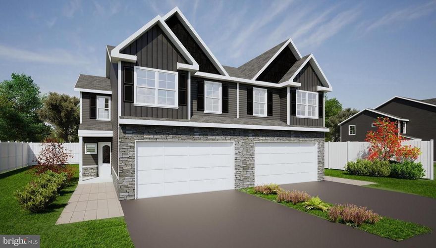 Flooded with natural light!  This 3 bedroom, 2.5 bath semi-detached home offers over 1,800 sq. ft. of thoughtfully designed living space plus a 2-car garage. The open kitchen is complete with granite countertops and a center island with seating and is perfect for gatherings and everyday meals. The living area creates a warm and welcoming atmosphere throughout. Upstairs, the spacious primary suite feels like a retreat with its cozy seating area, walk-in closet, and private bath with a double vanity. A second-floor laundry adds convenience you’ll love.  This property offers the perfect balance of privacy and neighborhood charm.