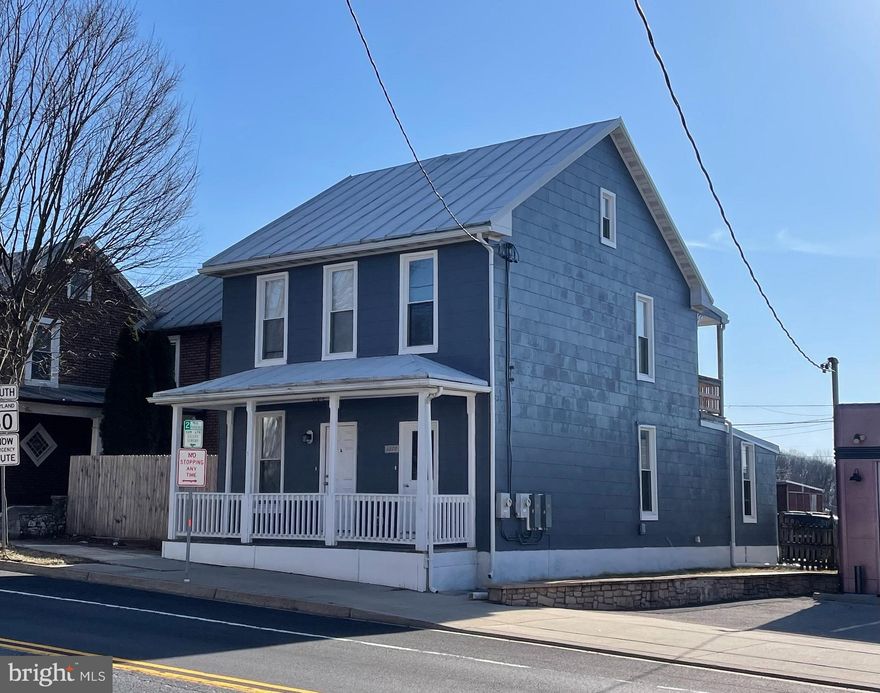 Fully permitted gut renovation in 2023! Two beautiful fully rented, legal and approved units with individual HVAC/CAC, recessed lighting, new thermal windows, carpet & LVP flooring, custom trim, stacked front load washer/dryer, modern kitchens with stainless appliances & dishwasher,  new baths with tubs and more! Unit 1 on the main level includes covered front porch, rear patio, front and rear entry, large living room, modern kitchen, 2 bedrooms, full bath and laundry. Unit 2 on the second and third levels includes covered rear porch, foyer and rear entry, large living room, modern kitchen, 2 bedrooms (Master is entire 3rd level), full bath and laundry.  Basement is fully insulated. Rear yard has 9 parking spots and small side yard. The home also features sprinkler system, insulation to code, 3/4 drywall, fire proofing, all new electric including separate services, all new plumbing, new water heaters and water shut off in both units and more! Interior photos are from January 2024 prior to being rented.