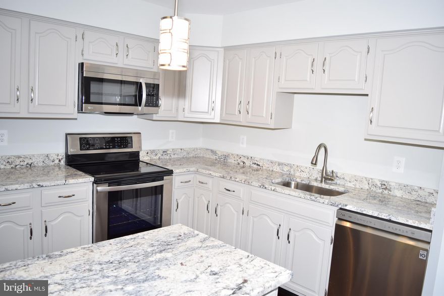 Mutliple Offers** Remodeled townhome style condo w attached garage**Heart of North Bethesda** Brand new kitchen with new granite counter and appliances** Hardwood through out the house**luxurious master bath with tub and standing shower**High Ceilings**Min to 495 and I 270.  Swimming Pool,Tennis Courts, and Timberlawn Park **Close to metro and Whole Foods, Restaurants**Walter Johnson HS.