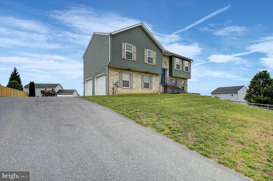 This charming split foyer home in Nottingham Meadows offers a blend of comfort, functionality, and opportunity. Built in 2005, the property features a new roof (6/2023), new durable vinyl siding (7/2025), and sits on a spacious 0.38-acre lot, providing ample front and rear yard space for outdoor activities.
Inside, the home boasts three bedrooms and two full bathrooms, designed with a traditional floor plan that enhances flow and accessibility. The inviting combination dining/living area is perfect for gatherings, while the family room off the kitchen ensures a cozy atmosphere for everyday living. The kitchen is equipped with essential appliances, including an electric oven/range, dishwasher, and refrigerator, making meal preparation a breeze.
The fully finished basement offers additional living space with daylight windows and a walkout level—ideal for entertaining or creating your own private retreat. The laundry area is conveniently located on the lower floor, featuring both washer and dryer units.
Outdoor living is just as enjoyable with a balcony and deck, perfect for relaxing, hosting barbecues, and taking in the amazing sunsets. The attached two-car garage provides easy access and ample storage, complemented by a driveway that accommodates six additional vehicles.
While some interior finishes, including carpeting, offer an opportunity for a fresh update, and a few deck boards could benefit from replacement, these minor improvements provide the perfect chance to add your own personal touch and truly make this home your own.
With no through street traffic, this property ensures a peaceful setting while remaining close to local amenities. Experience the perfect blend of comfort, convenience, and potential in this delightful home.