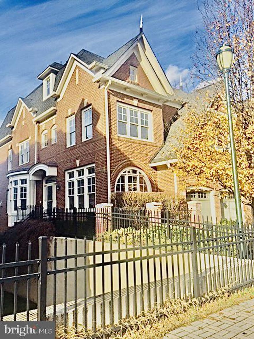 Gorgeous End Unit Townhouse in highly sought after River Creek community.  This Michael Harris home boasts remodeled kitchen, hardwood floors throughout the house, luxurious master bath with amazing oversized shower.  Main floor with soaring ceilings and tons of light in the living room.  The finished walkout basement offers plenty of room for games and relaxation.  A bedroom and full bath, make this a great place for guest room. Sit on the deck and look out into the woods for great privacy and serenity.  This is a must see!